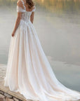 A-Line Off-The-Shoulder Tulle Wedding Dresses With Appliques Lace